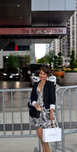 Standing in front of the Ritz-Carlton
