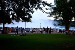 Tourists gather in front the falls