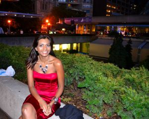 Nelly in an elegant red dress