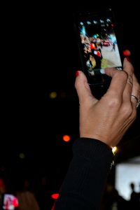 Picture of a fan taking a photo