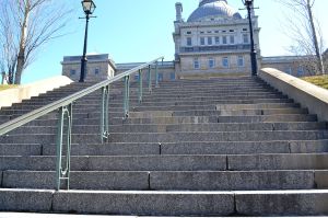 Grand stairs leading to a majestic building in New Montreal